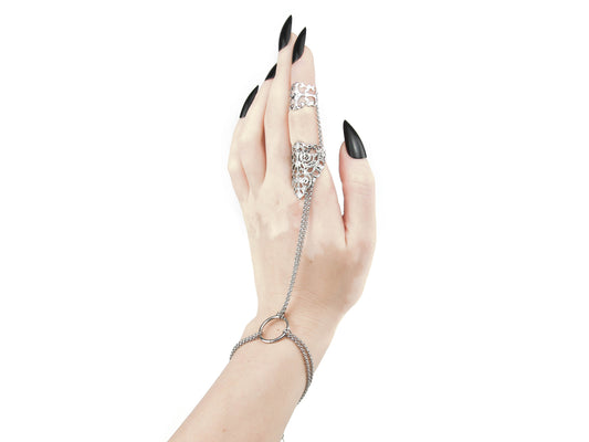 Elegant gothic Freya ring chain bracelet featuring intricate dark jewelry design, perfect for gothic weddings or as an avant-garde statement piece, handcrafted in Italy showcasing the sophisticated futuristic avant-garde aesthetic of Myril Jewels.