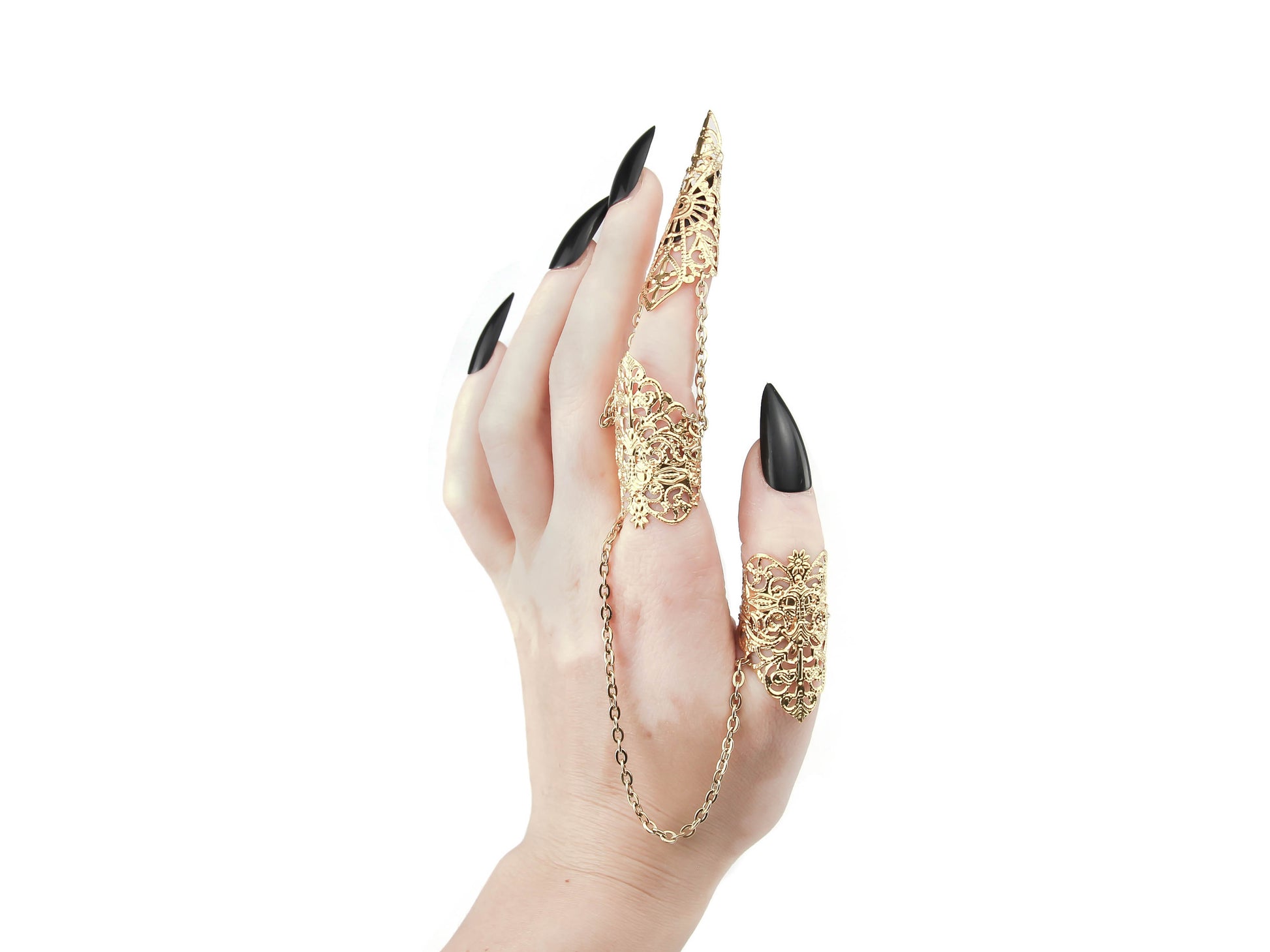 A hand adorned with Myril Jewels' gothic double ring, exuding dark avant-garde elegance with gold nail claw design. Perfect for those who cherish neo-gothic jewels and bold, witchcore aesthetics, this piece serves as a distinctive statement for Halloween, rave parties, or as a daring goth girlfriend gift.