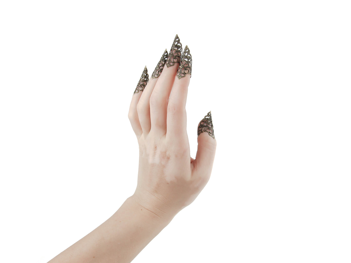 Striking goth nail rings in bronze, also known as claws, from Myril Jewels, showcasing the essence of dark avant-garde fashion. These neo-gothic jewels are perfect for adding a bold touch to Halloween costumes, punk styles, or everyday wear for those with a whimsigoth or witchcore aesthetic.