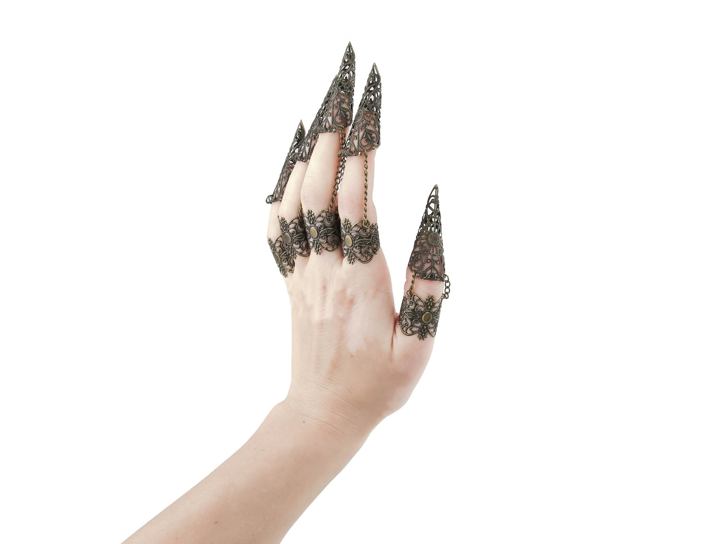A full hand set of intricate bronze claw rings from Myril Jewels, capturing the spirit of neo-goth fashion for a dramatic statement. These lavish rings are ideal for Halloween, aligning with the punk and gothic-chic vibe, and versatile enough for everyday wear. Perfect for those who favor witchcore or whimsigoth styles, they're a bold choice for rave parties, festivals, or as a daring goth girlfriend gift.