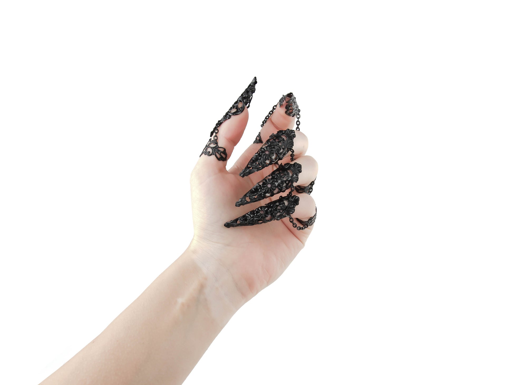 Embrace the edgy elegance of Myril Jewels with this bold, handcrafted full hand set of armored claw rings, designed for the dark-avantgarde enthusiast. These elaborate black claw rings reflect a Neo Gothic vibe, perfect for gothic-chic, Witchcore, and Whimsigoth styles, making them an audacious choice for Halloween, punk events, or as a distinctive addition to everyday wear.