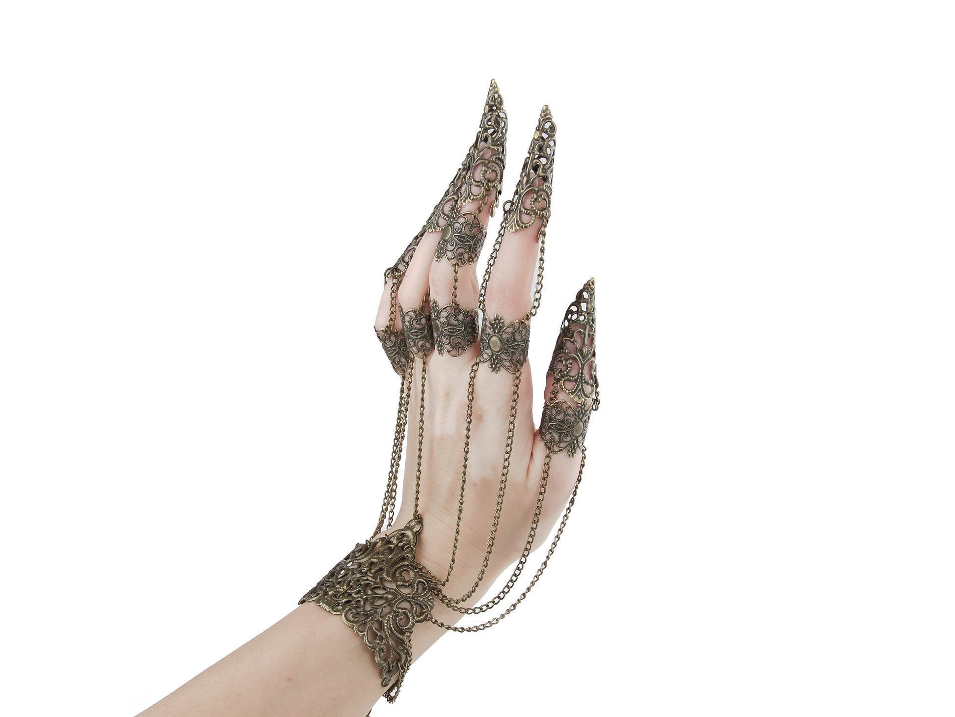 An intricate bronze metal glove with finger claw rings from Myril Jewels, blending gothic-chic style with neo-gothic artistry. Ideal for those seeking bold witchcore jewelry, it’s perfect for Halloween, rave parties, or as a standout piece in a minimal goth wardrobe.