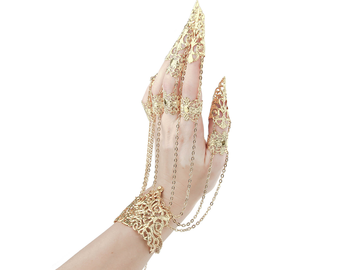 A captivating gold metal glove with finger claw rings from Myril Jewels, combining gothic-chic with neo-goth design. Ideal for Halloween, this unique piece makes a bold statement for witchcore lovers and is perfect for adding a daring touch to everyday wear or festival outfits.
