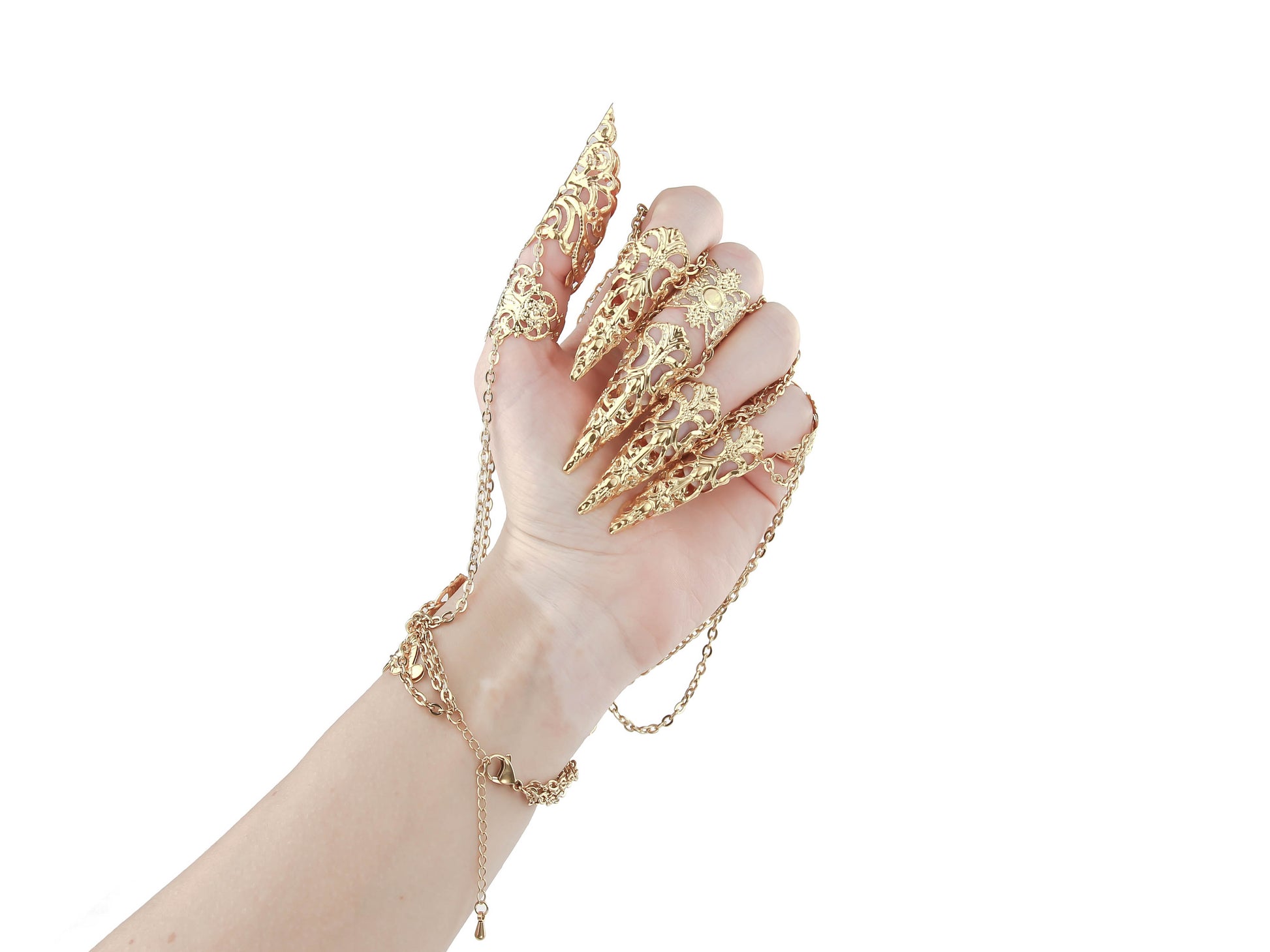 A captivating gold metal glove with finger claw rings from Myril Jewels, combining gothic-chic with neo-goth design. Ideal for Halloween, this unique piece makes a bold statement for witchcore lovers and is perfect for adding a daring touch to everyday wear or festival outfits.