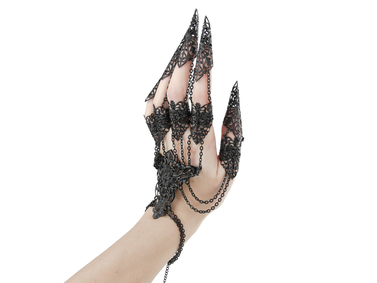 A fashion-forward black metal glove adorned with finger claw rings by Myril Jewels, epitomizing the essence of neo-gothic style. This striking accessory merges dark avant-garde aesthetics with bold, gothic-chic flair, perfect for Halloween, rave parties, or as a unique gift for goth enthusiasts.