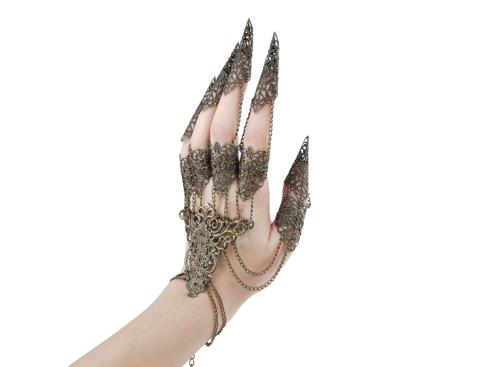 A fashion-forward metal glove with bronze finger claw rings by Myril Jewels, embodying dark avant-garde elegance. Perfect for gothic and alternative style lovers, this bold accessory adds a touch of neo-gothic flair to any ensemble, ideal for Halloween events or everyday wear.