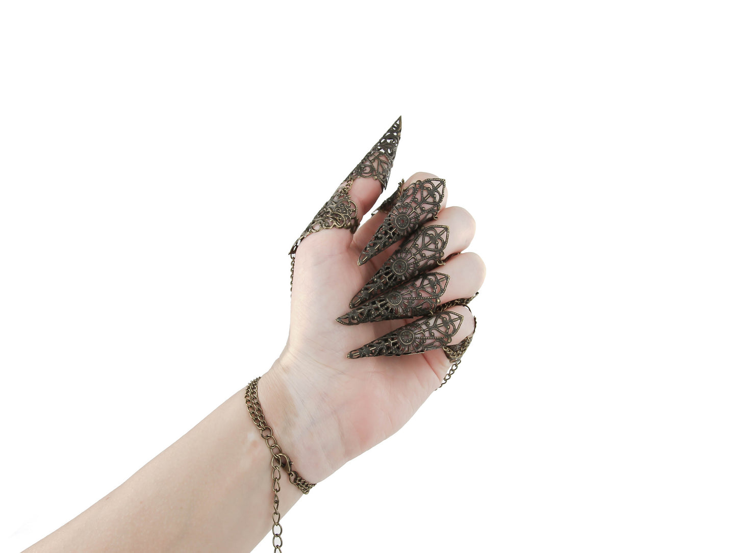 A fashion-forward metal glove with bronze finger claw rings by Myril Jewels, embodying dark avant-garde elegance. Perfect for gothic and alternative style lovers, this bold accessory adds a touch of neo-gothic flair to any ensemble, ideal for Halloween events or everyday wear.