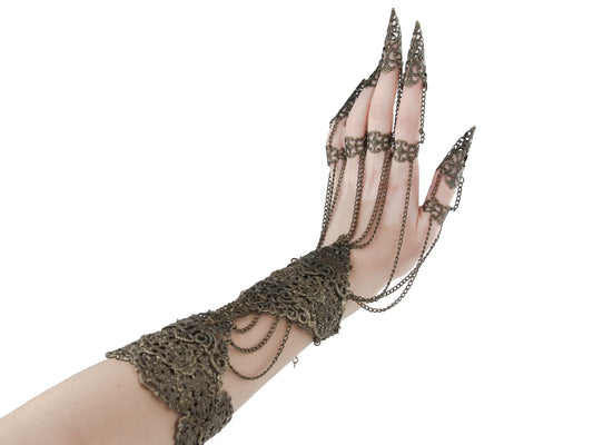 Dramatic Myril Jewels full hand armor with elongated claws, showcasing a dark, whimsigoth aesthetic that travels up the arm. A quintessential piece for neo-gothic collectors and a standout accessory for Halloween, festivals, or as an impactful goth girlfriend gift, reflecting a true avant-garde spirit.