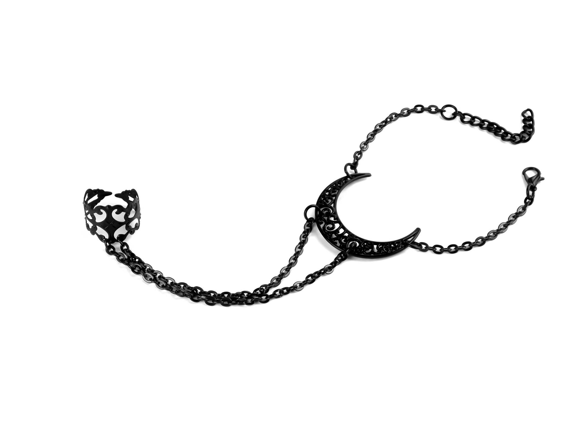Discover Myril Jewels' mystical black hand chain, featuring a moon-inspired bracelet, perfect for gothic enthusiasts seeking a touch of the nocturnal in their accessories, a blend of elegance and alternative style.