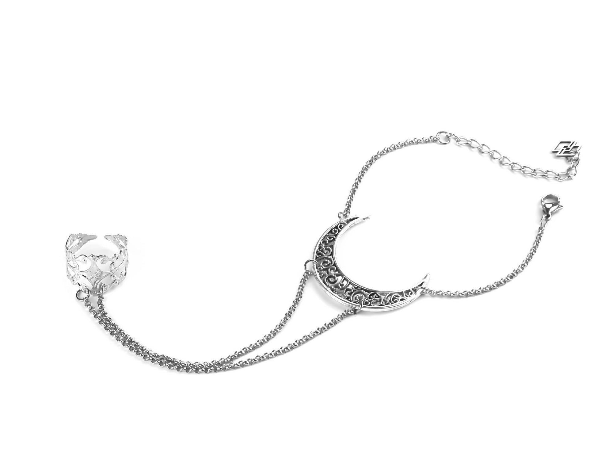 This Myril Jewels hand chain features a moon-inspired bracelet, perfect for those who love dark avant-garde style. Ideal for Halloween, it's a unique gift for gothic jewelry aficionados.