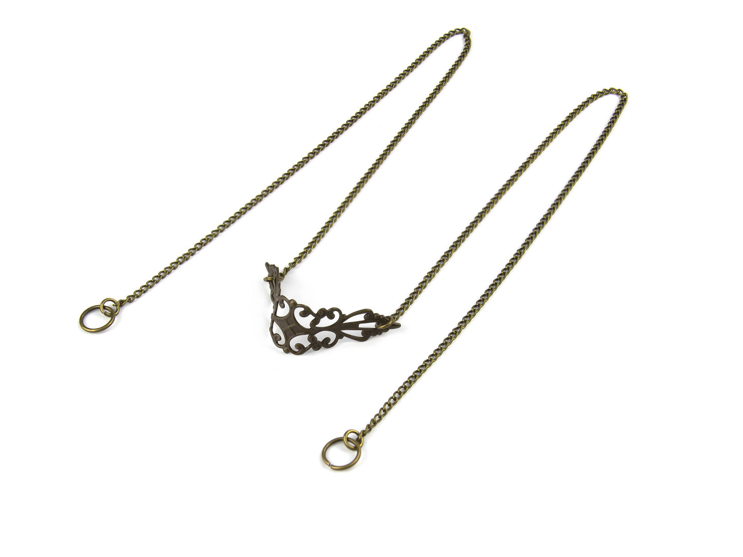 Elegant Myril Jewels bronze nose chain, with a detailed filigree design, exuding neo-gothic charm, set against a pure white background, perfect for gothic-chic fashion statements