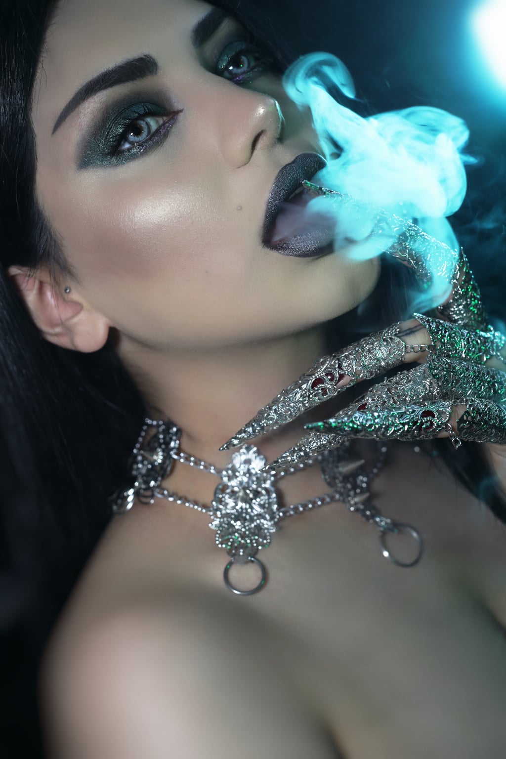 Embrace the night with Myril Jewels' punk studded metal choker, a masterpiece of dark avant-garde jewelry. This statement piece, perfect for gothic and alternative style enthusiasts, features intricate metalwork and shimmering accents. It's designed for those who dare to stand out, suitable for Halloween, Neo Gothic events, or as a daily symbol of Gothic Lolita and Gothic-chic fashion. For the whimsigoth and witchcore admirer, it's an essential accessory that embodies everyday wear with a minimal goth edge