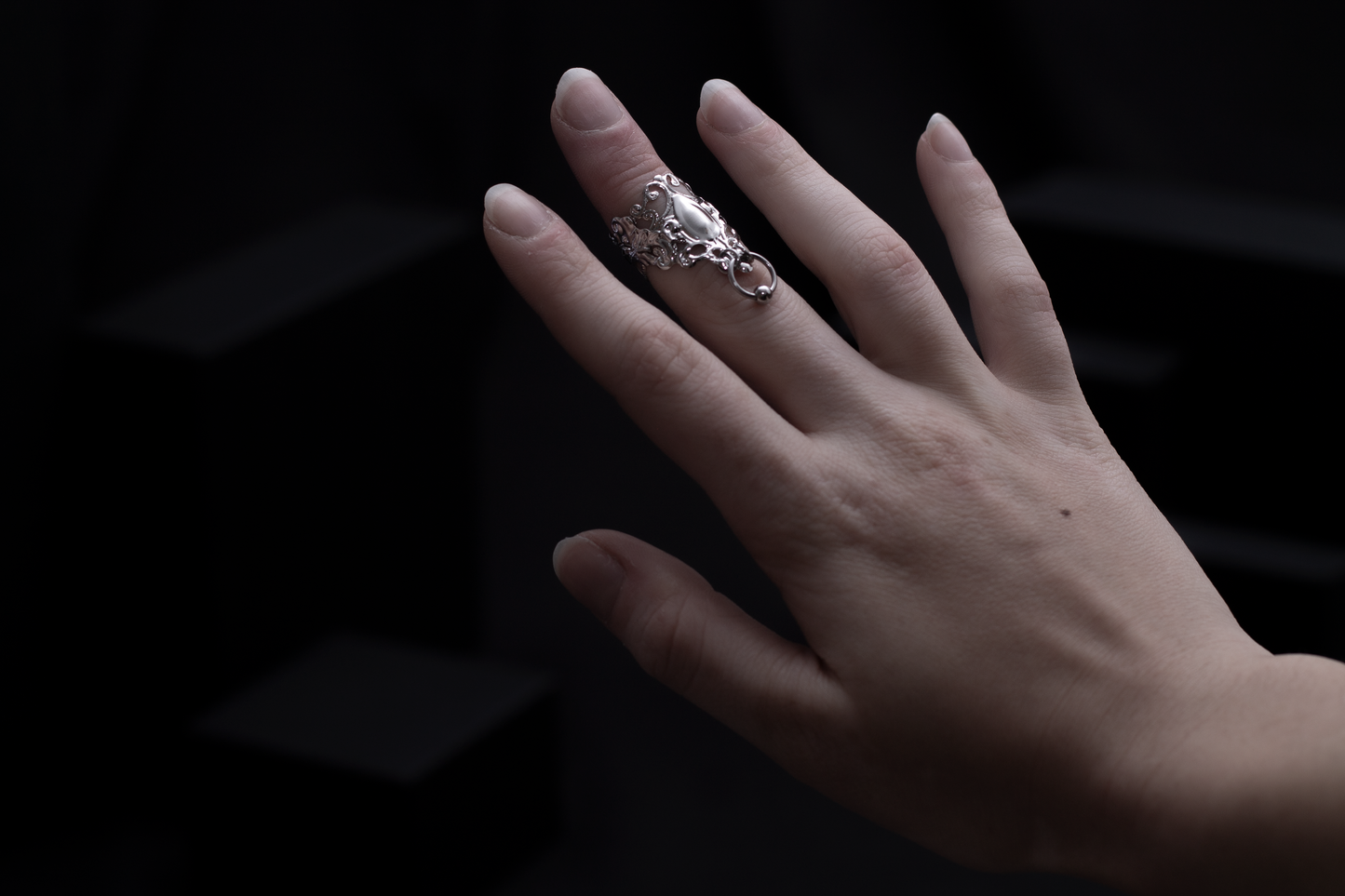 Myril Jewels presents a sophisticated midi ring, embodying neo-gothic charm with its delicate filigree and bold design. This piece, perfect for gothic-chic and whimsigoth enthusiasts, adds an enigmatic touch to everyday wear and is an ideal goth girlfriend gift or a unique find for festival jewelry collectors.