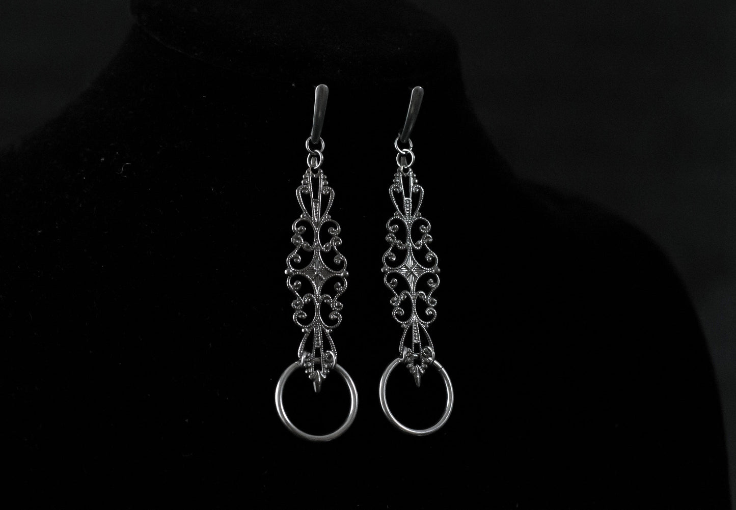 Elegant filigree earrings with O-ring detail from Myril Jewels, reflecting neo-gothic charm for a bold, gothic-chic style statement, perfect for any avant-garde ensemble