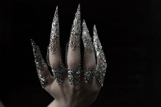 Which is the best way to put nail claw rings on?