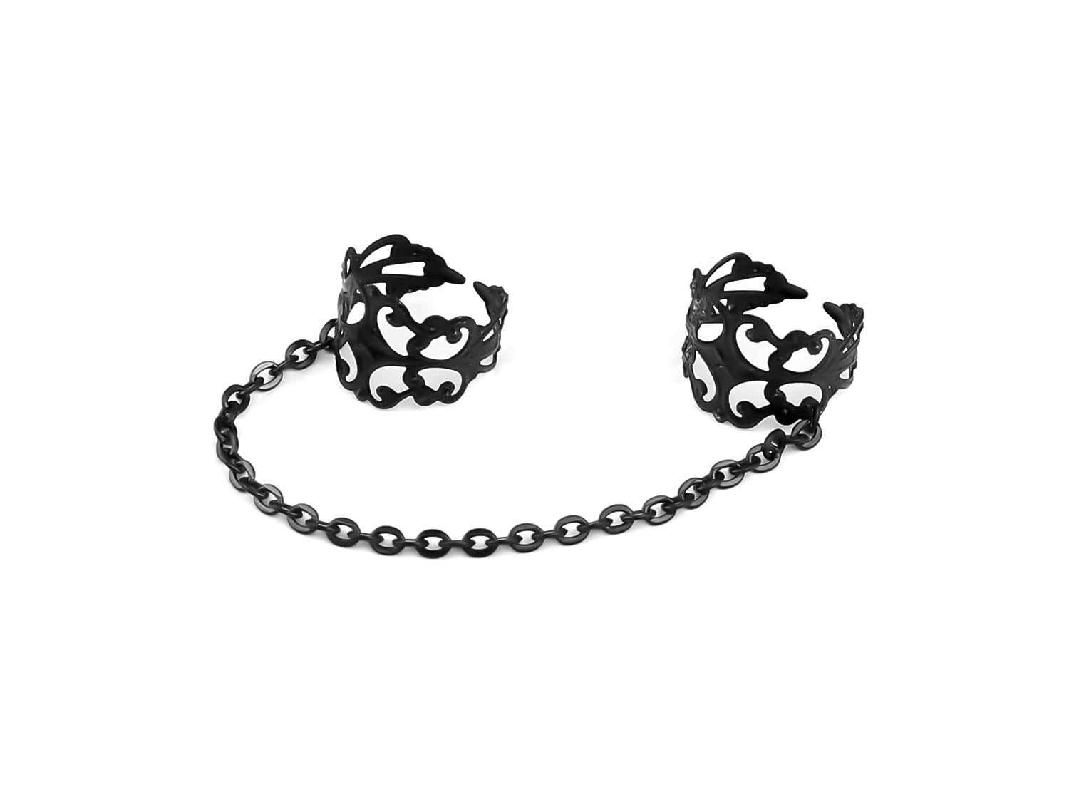 Intricately crafted Myril Jewels black double rings connected by a fine black chain, embodying a dark avant-garde aesthetic for gothic and alternative style enthusiasts. These unique pieces showcase a Neo Gothic charm, ideal for Halloween or Witchcore fashion statements, merging punk edge with Gothic-chic elegance, perfect for those who revel in a whimsigoth and Gothic Lolita inspired look. Handmade in Italy, these double rings represent sophisticated futuristic avant-garde