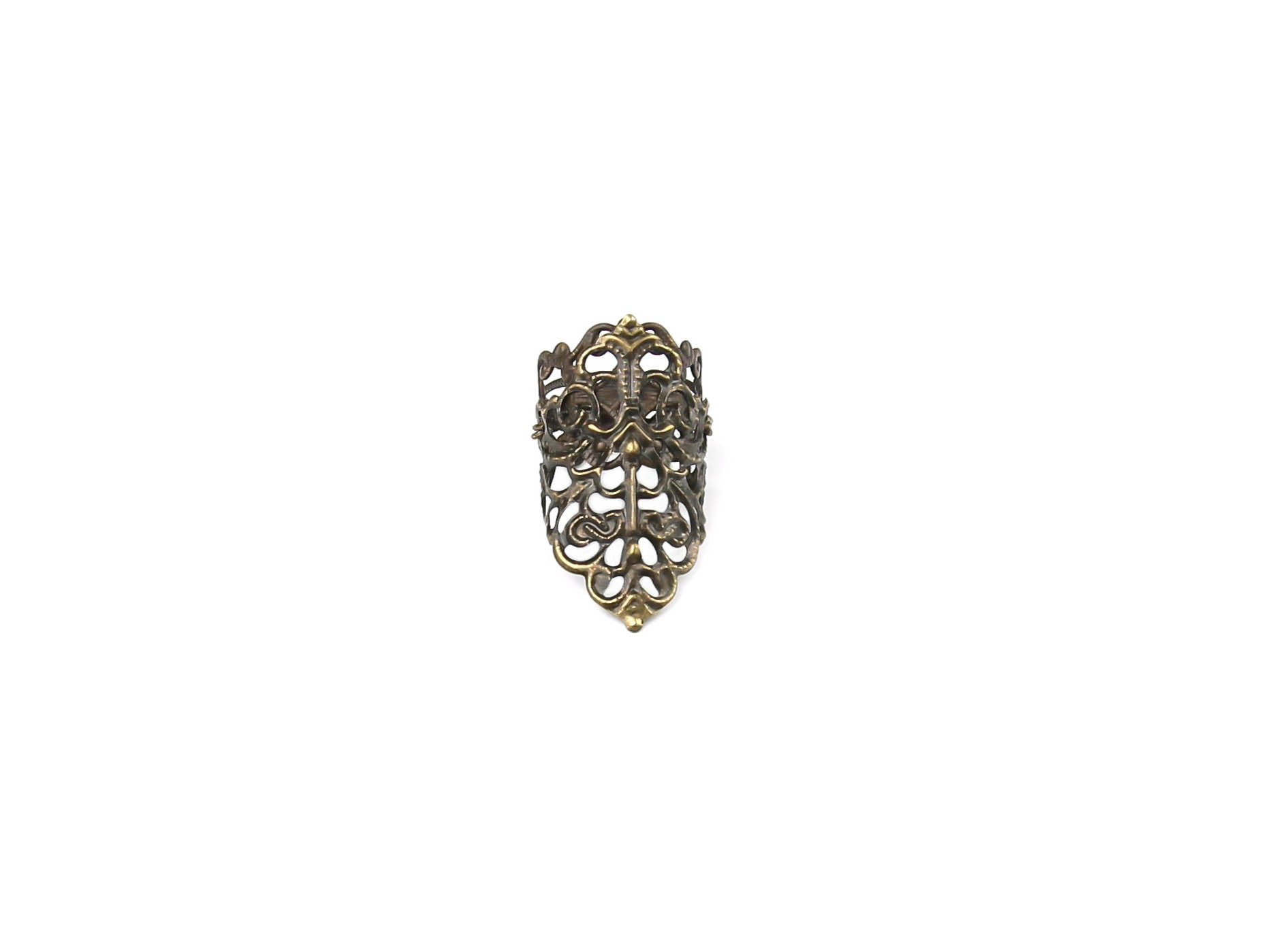 eaturing a Myril Jewels goth midi ring, this image captures a dark-avantgarde accessory quintessential for gothic and alternative style connoisseurs. The ring showcases an intricate design, meticulously crafted to embody the essence of neo-gothic luxury. Its bold, yet delicate structure makes it a versatile piece, ideal for adding a touch of witchcore elegance to everyday wear or for complementing a whimsigoth outfit at a rave party or festival.