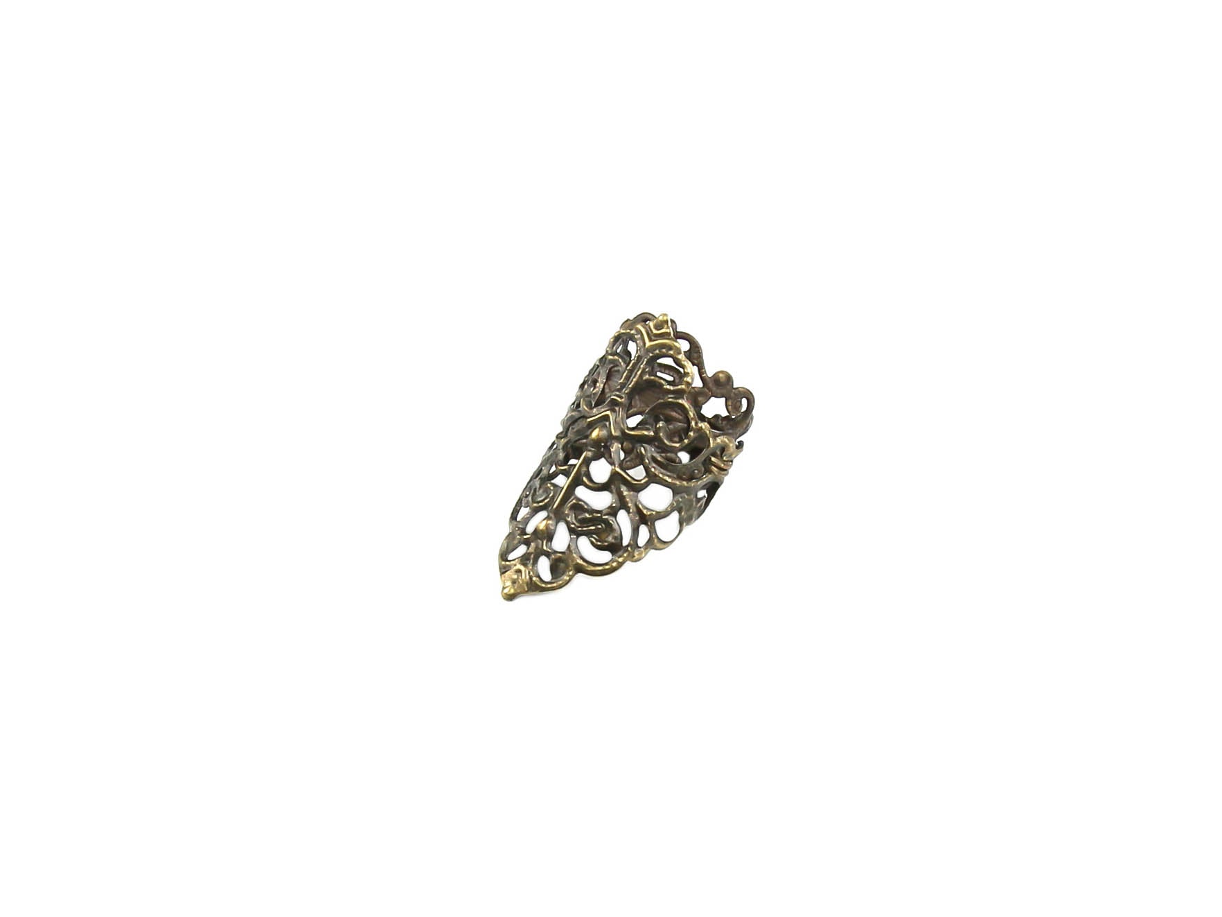 Featuring a Myril Jewels goth midi ring, this image captures a dark-avantgarde accessory quintessential for gothic and alternative style connoisseurs. The ring showcases an intricate design, meticulously crafted to embody the essence of neo-gothic luxury. Its bold, yet delicate structure makes it a versatile piece, ideal for adding a touch of witchcore elegance to everyday wear or for complementing a whimsigoth outfit at a rave party or festival.