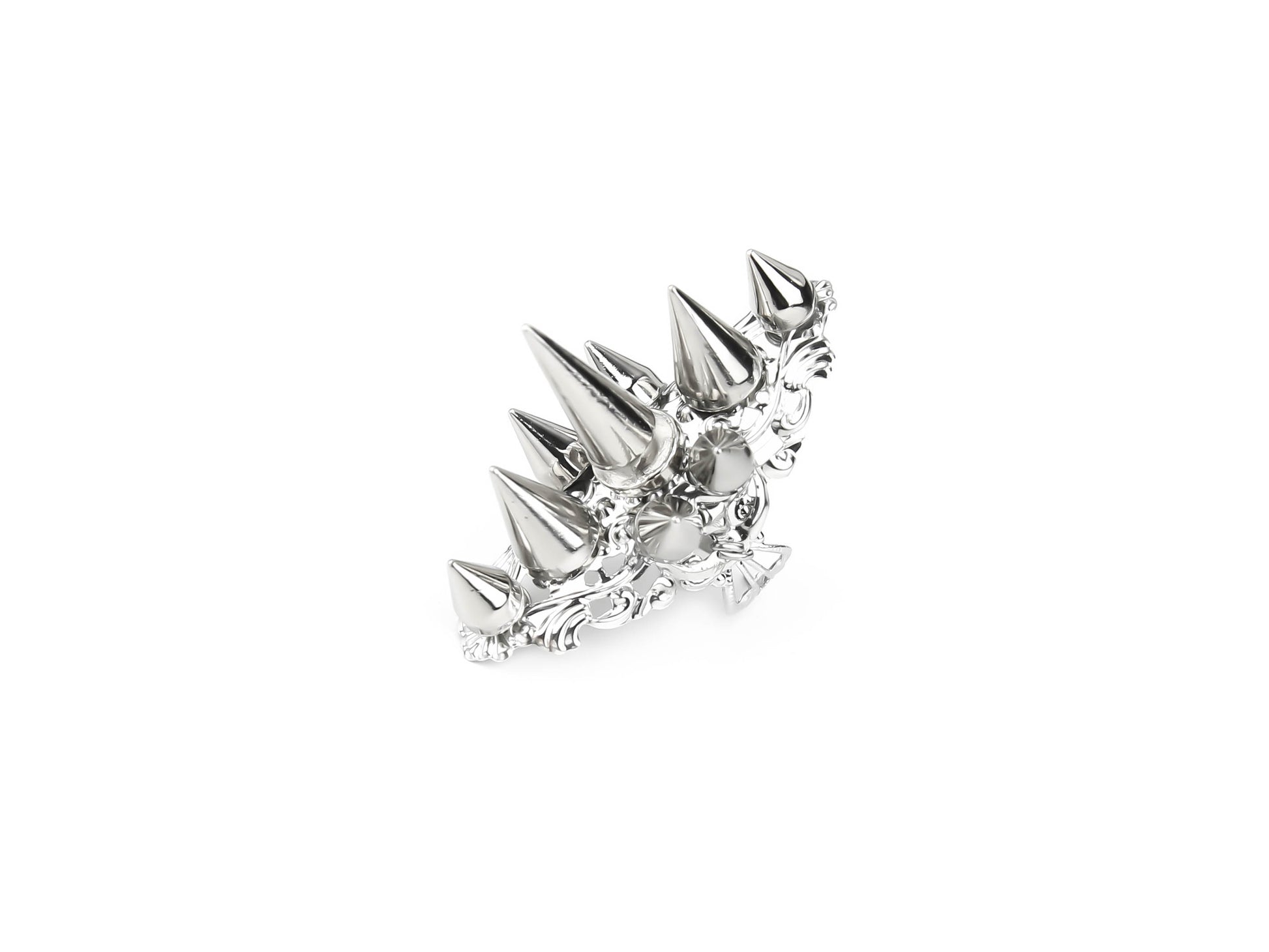 This Myril Jewels punk studded ring, designed with a series of spikes and intricate filigree, embodies the essence of dark avant-garde. Crafted for the gothic and alternative fashion lover, it's a bold statement piece that aligns with Neo Gothic, Gothic-chic, and Witchcore aesthetics. Ideal for Halloween, or as a standout accessory in everyday wear, this ring is a must-have for those who embrace a minimal goth lifestyle or Whimsigoth elegance.