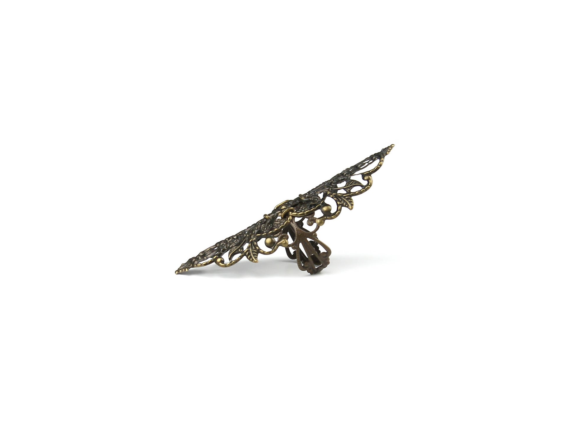An elegantly crafted wide bronze gothic ring from Myril Jewels, this piece is a stunning accessory for those with a love for neo-gothic and alternative styles. It's an ideal complement to a Halloween ensemble or punk attire, perfect for daily wear in a minimal goth wardrobe, and a standout choice for festivals or rave parties. This ring serves as a thoughtful, bold gift for the witchcore-adoring goth girlfriend or friend.