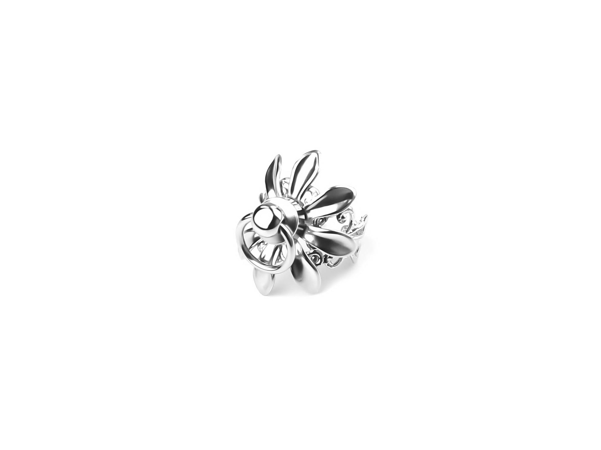 Striking Myril Jewels Flower ring, crafted in Italy, gleams against a pristine background. Its dark-avantgarde design with floral-inspired elements is perfect for those seeking bold, gothic-style accessories.