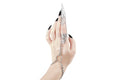 A hand is elegantly displayed wearing a Myril Jewels gothic bracelet, extending into a claw ring via connected chains. This jewelry piece is ideal for aficionados of neo-goth style and serves as a bold accessory for occasions like Halloween, or as a distinctive addition to everyday gothic-chic attire.