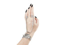 Embody the night with Myril Jewels' punk hand chain bracelet, a fusion of gothic-chic and avant-garde design. Crafted for the dark fashion connoisseur, this piece features intricate filigree work that forms an elegant ring-to-wrist chain, perfect for enhancing a Neo Gothic, Whimsigoth, or minimal goth look. Ideal for festivals, rave parties, or as a statement piece in a Witchcore collection, it's a quintessential Myril Jewel for Halloween and beyond