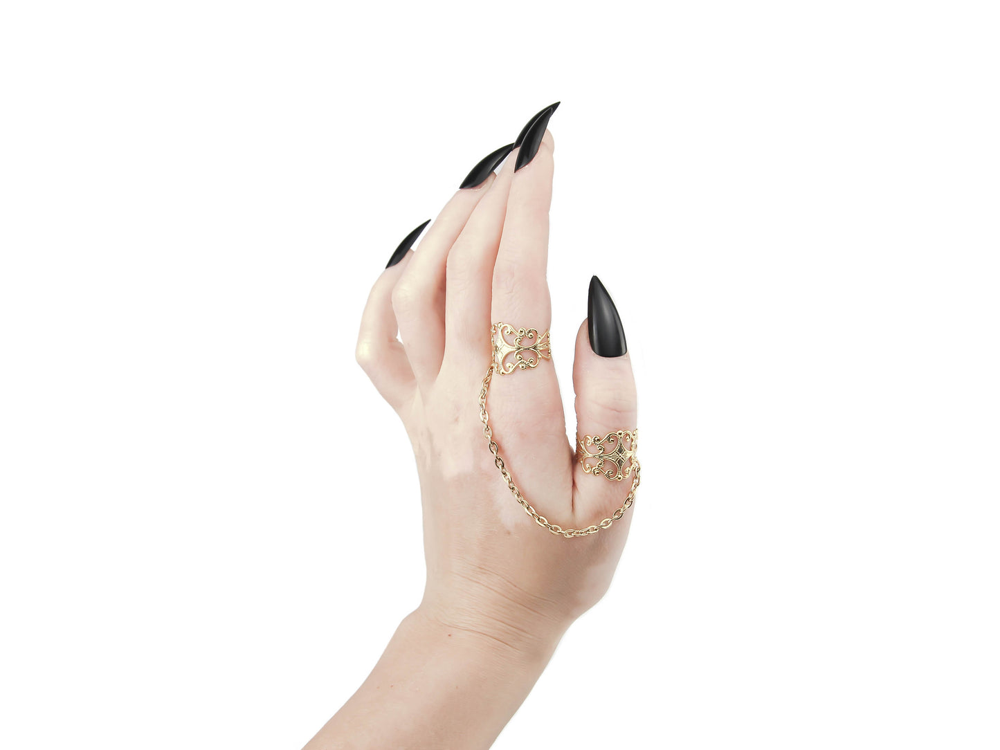 Elevate your gothic-chic style with Myril Jewels' delicate chain-linked rings, featuring intricate gold filigree. These rings, perfect for punk, whimsigoth, and witchcore enthusiasts, add a touch of neo-gothic elegance to any outfit, making them a stunning accessory for everyday wear or special occasions like Halloween.