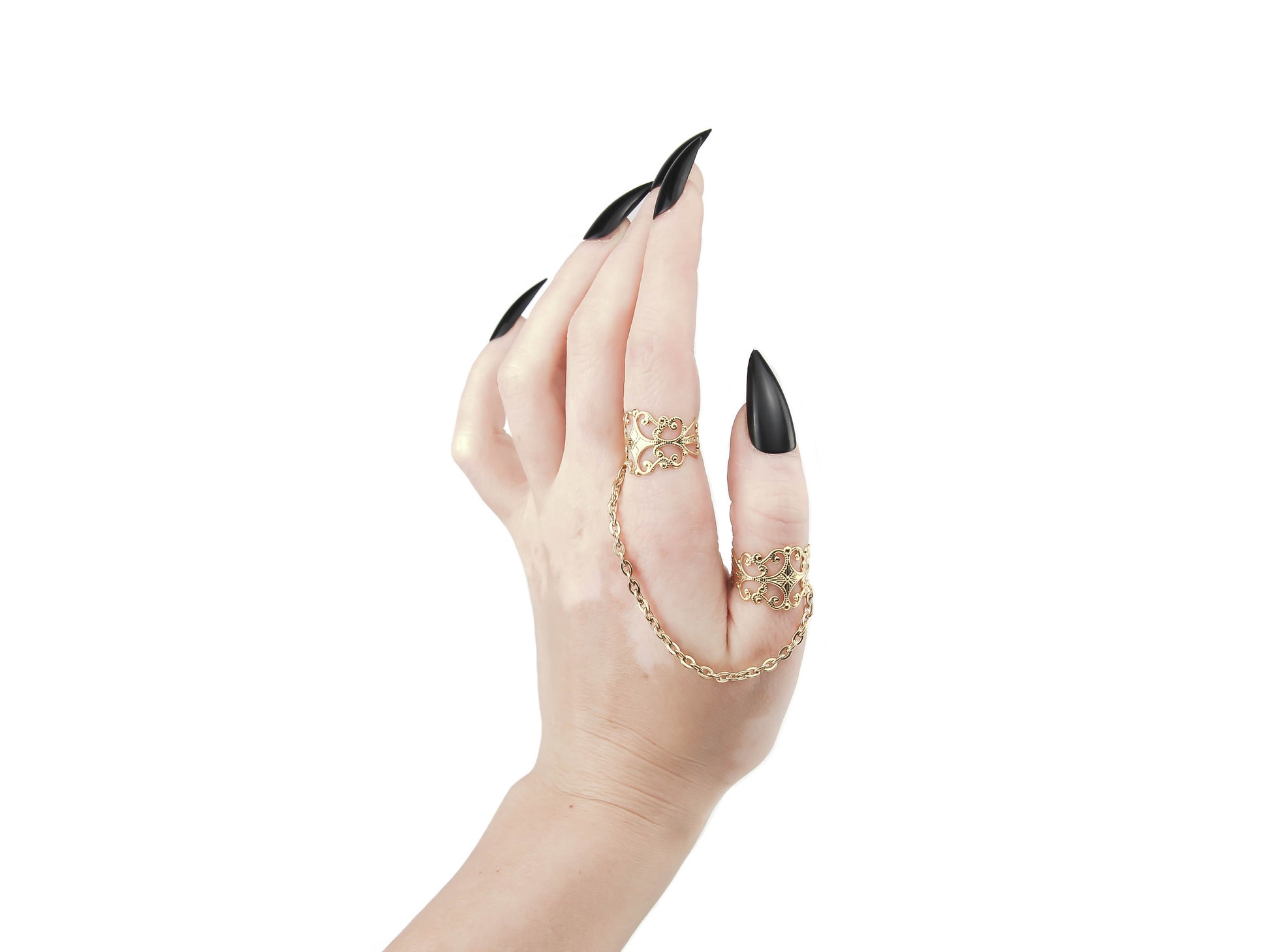 Elevate your gothic-chic style with Myril Jewels' delicate chain-linked rings, featuring intricate gold filigree. These rings, perfect for punk, whimsigoth, and witchcore enthusiasts, add a touch of neo-gothic elegance to any outfit, making them a stunning accessory for everyday wear or special occasions like Halloween.
