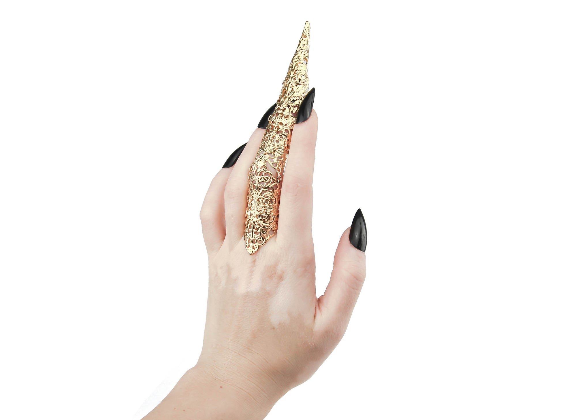A single, ornate full-finger gold claw ring with a sharp, long nail claw adorns a hand, reflecting Myril Jewels' signature dark avant-garde style. This Neo Gothic piece is a blend of Halloween and punk jewelry aesthetics, ideal for minimal goth enthusiasts or as a bold goth girlfriend gift.