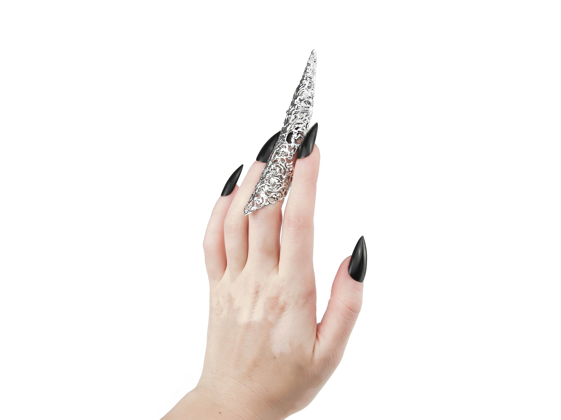 A delicate hand is accentuated by a single Myril Jewels midi ring with a dramatic long claw, embodying neo-goth elegance. This finely crafted piece is a quintessential accessory for gothic and alternative style lovers, perfect as a bold statement for everyday wear or as a unique goth girlfriend gift.