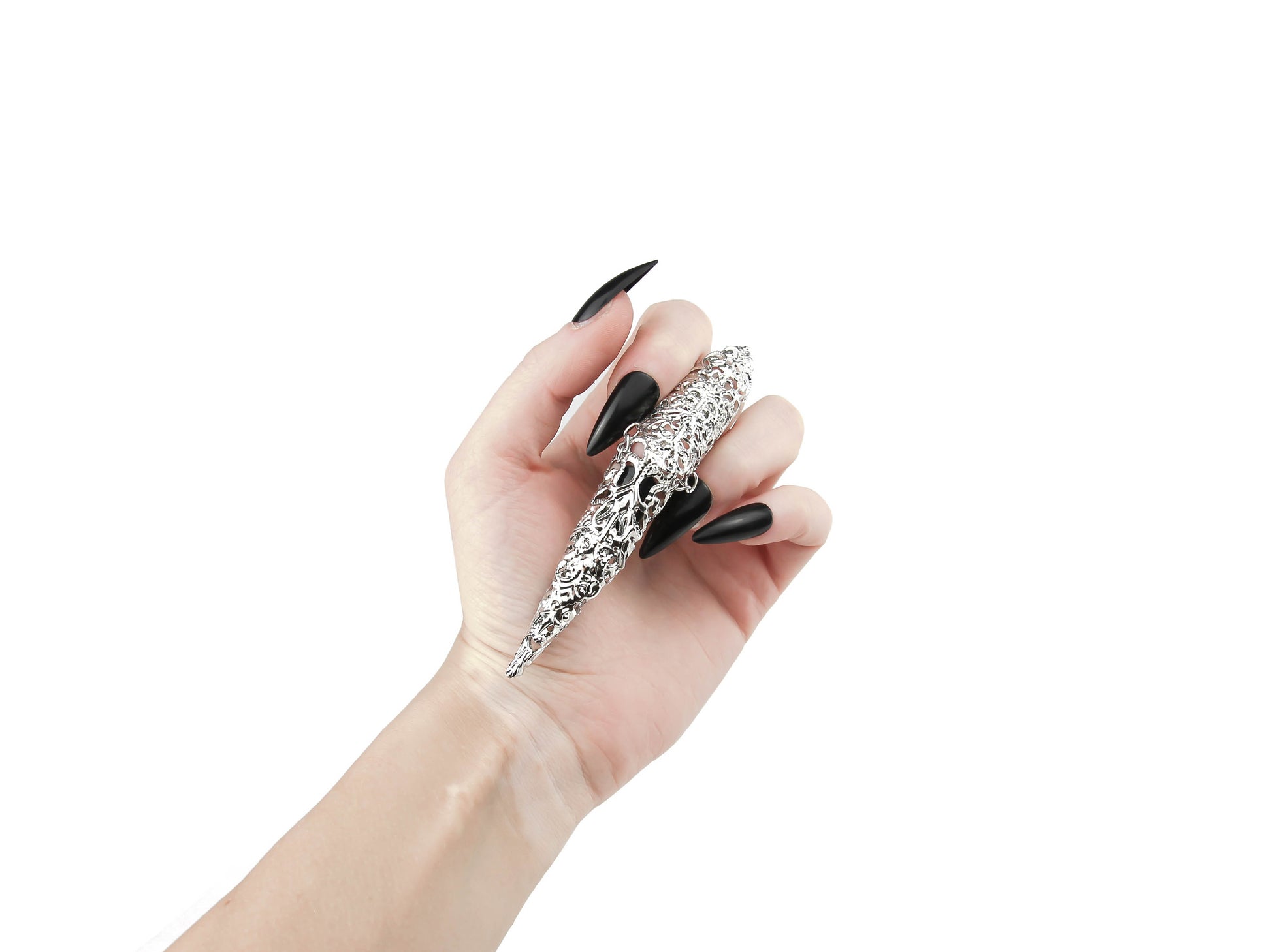 A delicate hand is accentuated by a single Myril Jewels midi ring with a dramatic long claw, embodying neo-goth elegance. This finely crafted piece is a quintessential accessory for gothic and alternative style lovers, perfect as a bold statement for everyday wear or as a unique goth girlfriend gift.