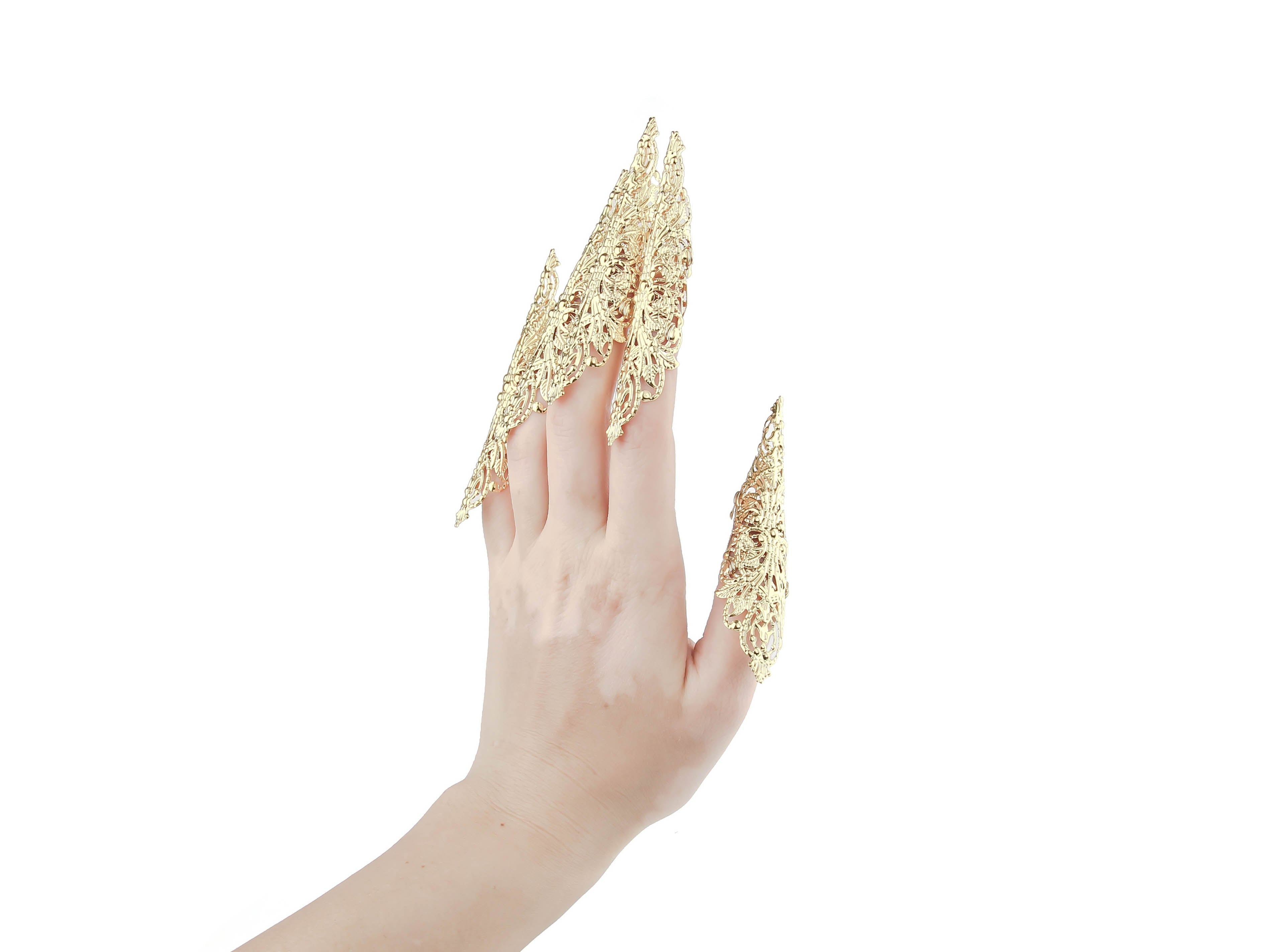 A full hand set of Myril Jewels' extra long gold nail claws presents an opulent neo-goth touch for enthusiasts of dark, avant-garde fashion. This striking collection is ideal for Halloween, punk styles, and whimsigoth fans, offering a bold complement to rave party attire or as a statement piece for the fashion-forward goth girlfriend.