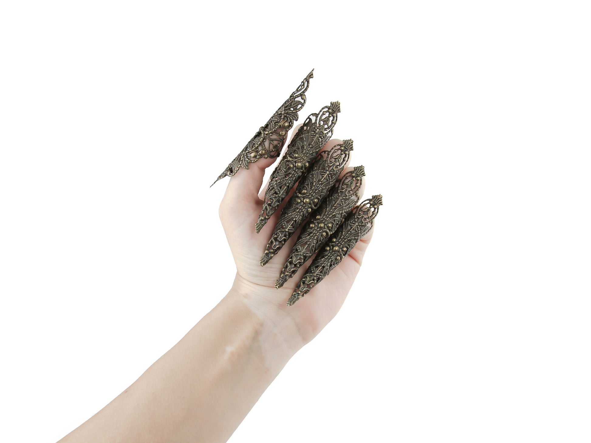 A striking full hand set of extra-long nail claw rings by Myril Jewels, crafted for the neo-goth jewelry lover. These claws embody a dark avant-garde aesthetic, perfect for Halloween, gothic-chic events, or as a bold accessory for everyday wear by those who embrace a witchcore or whimsigoth style.
