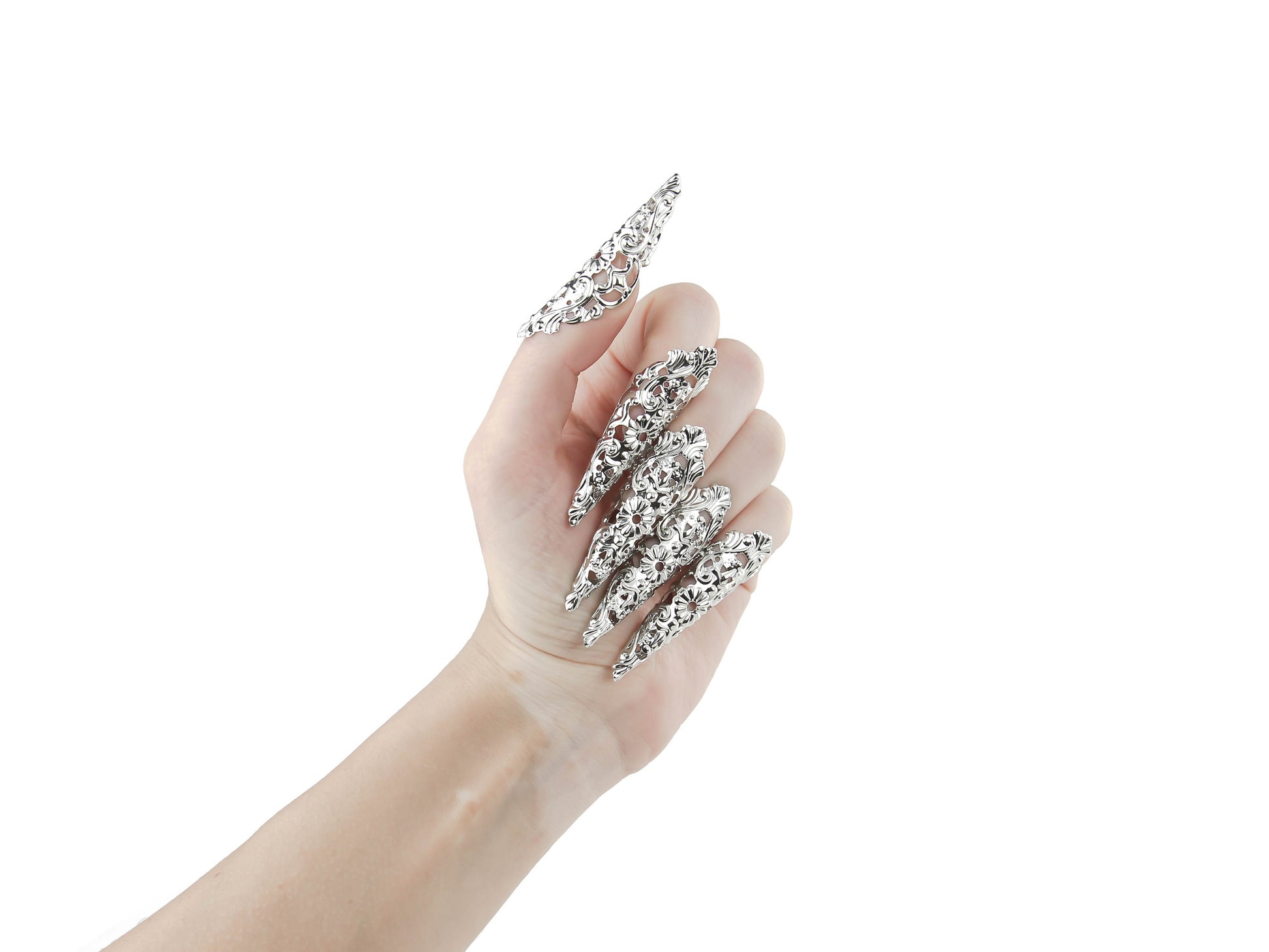 Striking goth nail rings, or claws, from Myril Jewels, perfect for a dark avant-garde look. These silver filigree claws are a statement of neo-gothic style, suited for Halloween, edgy everyday wear, or as a goth girlfriend gift, embracing the whimsigoth and witchcore trends.