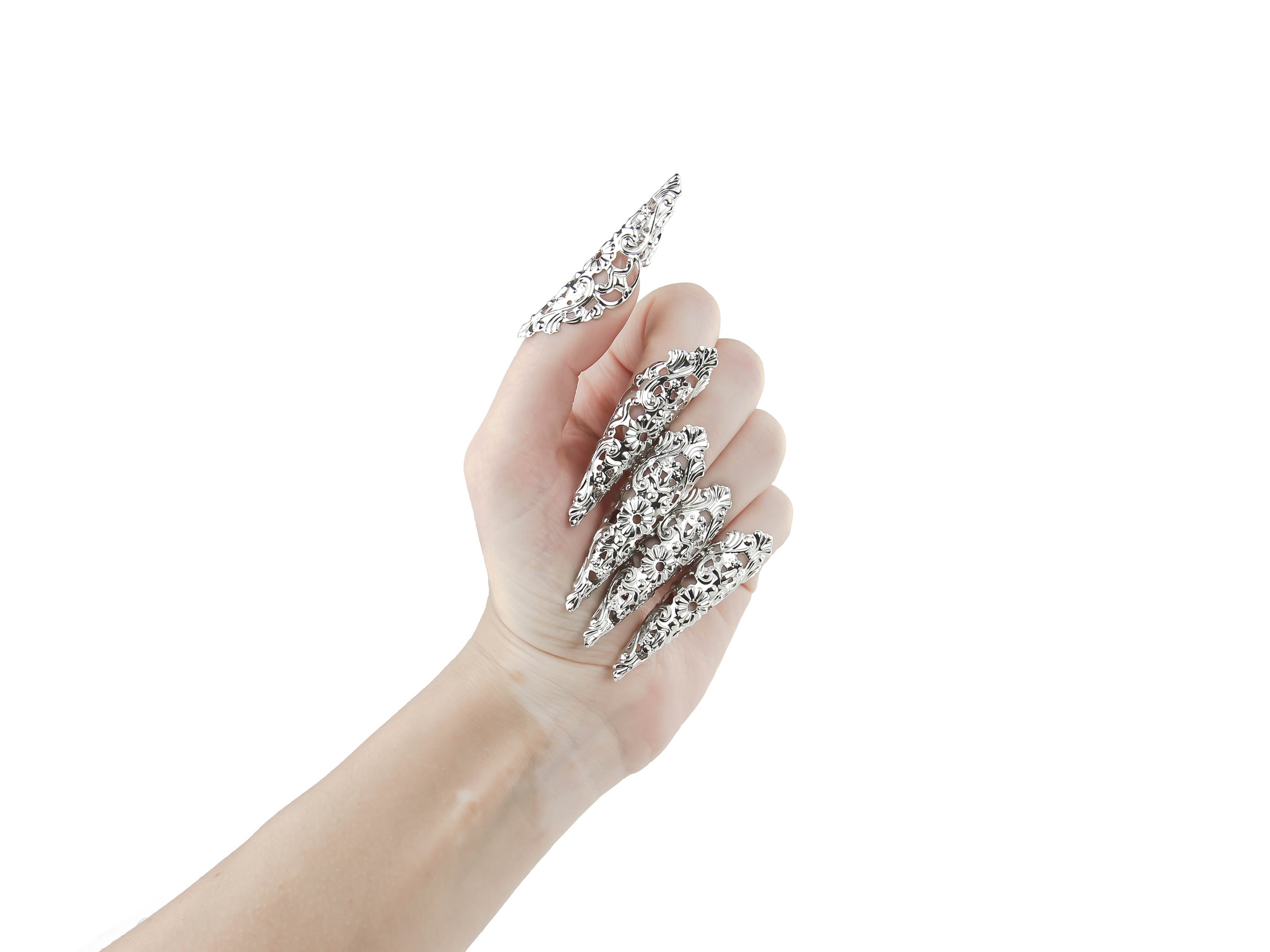 Striking goth nail rings, or claws, from Myril Jewels, perfect for a dark avant-garde look. These silver filigree claws are a statement of neo-gothic style, suited for Halloween, edgy everyday wear, or as a goth girlfriend gift, embracing the whimsigoth and witchcore trends.
