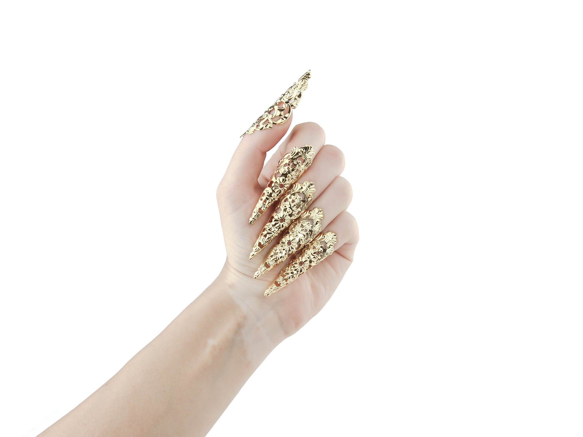 Delicate yet daring, these gothic gold nail jewels by Myril Jewels, known as claws, radiate a bold neo-gothic charm. Perfect for Halloween, punk fashion, or whimsigoth enthusiasts, these unique pieces are ideal for daily wear, rave parties, or festivals. They make a striking gift for the goth girlfriend or anyone who loves standout, handcrafted jewelry.