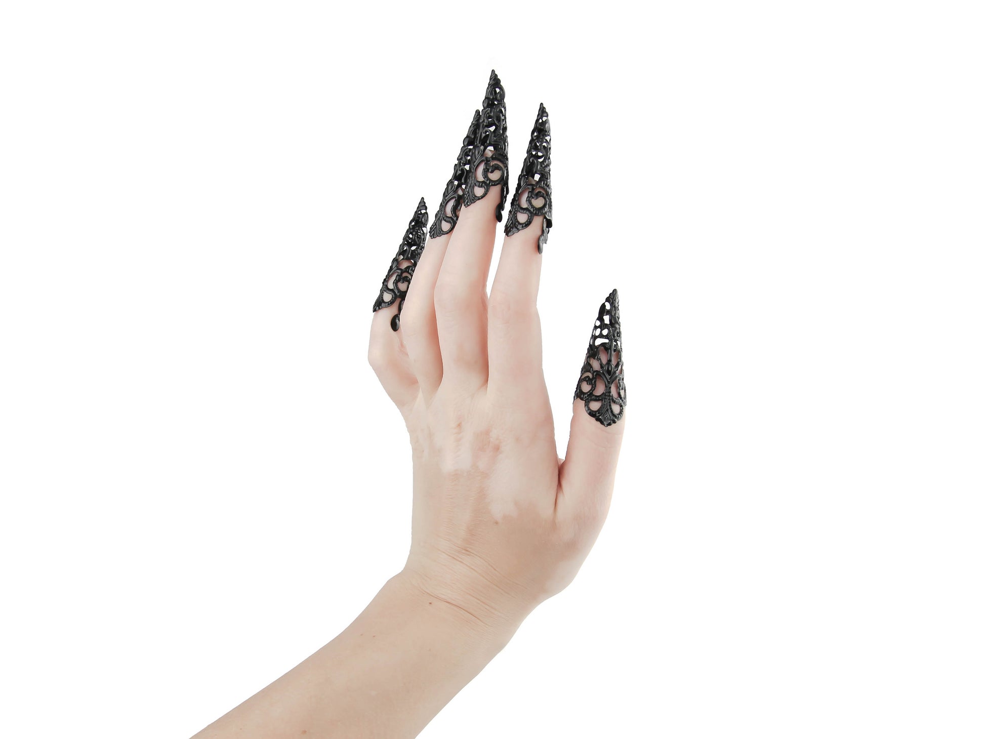 Elevate your style with Myril Jewels' long black finger claws, showcasing exquisite filigree work for a neo-gothic touch. Ideal for Halloween, these claws are a goth-chic statement, perfect for punk enthusiasts, rave parties, and those seeking bold witchcore accessories or a memorable goth girlfriend gift
