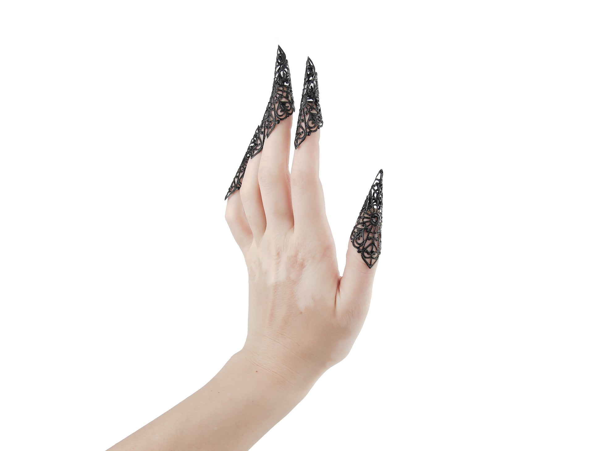 Exquisitely crafted Myril Jewels full hand set of black nail claws, intricately designed with a filigree that embodies the neo-gothic aesthetic, perfect for those embracing dark avant-garde fashion. This luxurious set aligns with the gothic-chic style, suitable for whimsical everyday wear, or as a bold statement for Halloween, rave parties, and festival occasions.