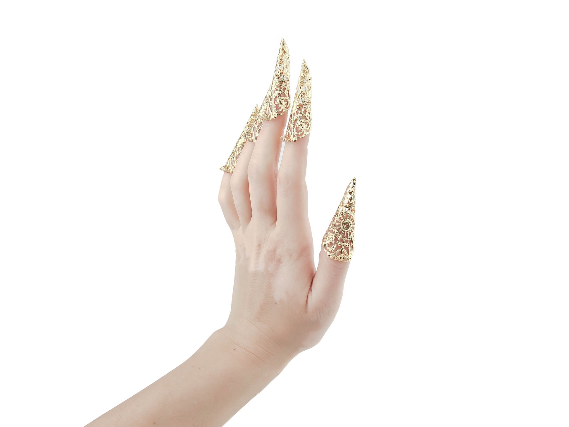 Showcased is a stunning full hand set of Myril Jewels gold nail claws, exuding a neo-goth flair with their intricate filigree design. These handcrafted claws are a bold statement for Halloween, complementing a punk jewelry look, and are perfect for those embracing a gothic-chic or whimsigoth lifestyle. Ideal for adding an edgy touch to everyday wear, they're also a standout accessory for rave parties and festival fashion