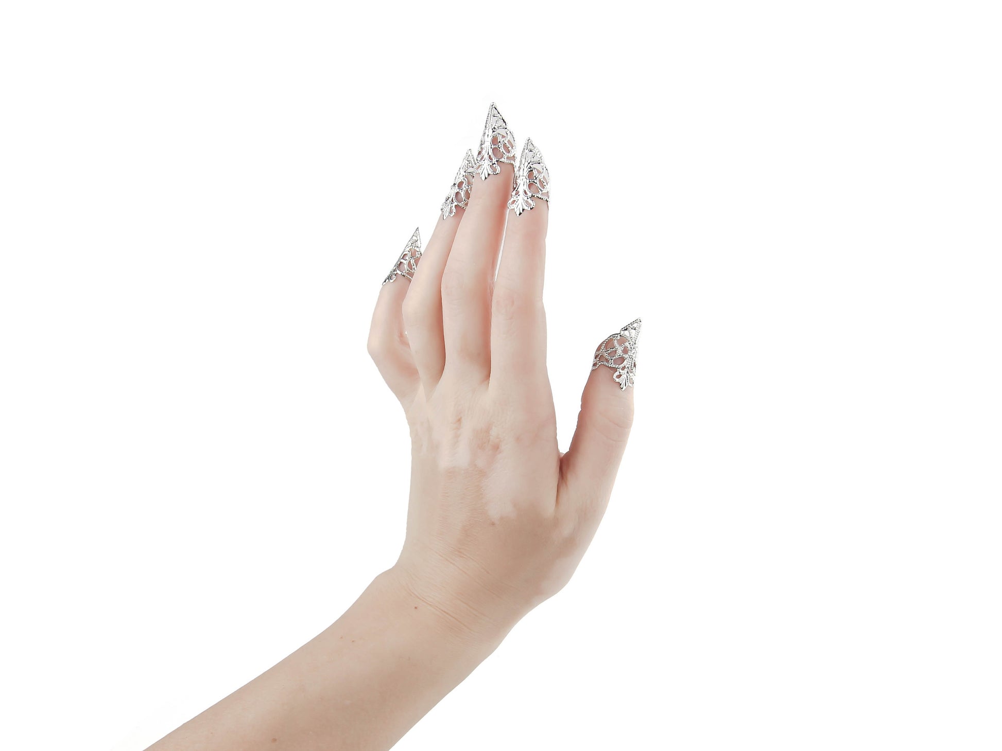 Elevate your gothic style with Myril Jewels' full hand set of silver claw rings, designed for the fashion-forward and darkly inclined. These nail claws are a statement of Neo Gothic sophistication, perfect for Halloween, punk fashion, and Gothic-chic events. Their delicate filigree work complements Whimsigoth and Witchcore aesthetics, making them a striking addition to everyday minimal goth attire and an edgy accessory for drag queens and performers