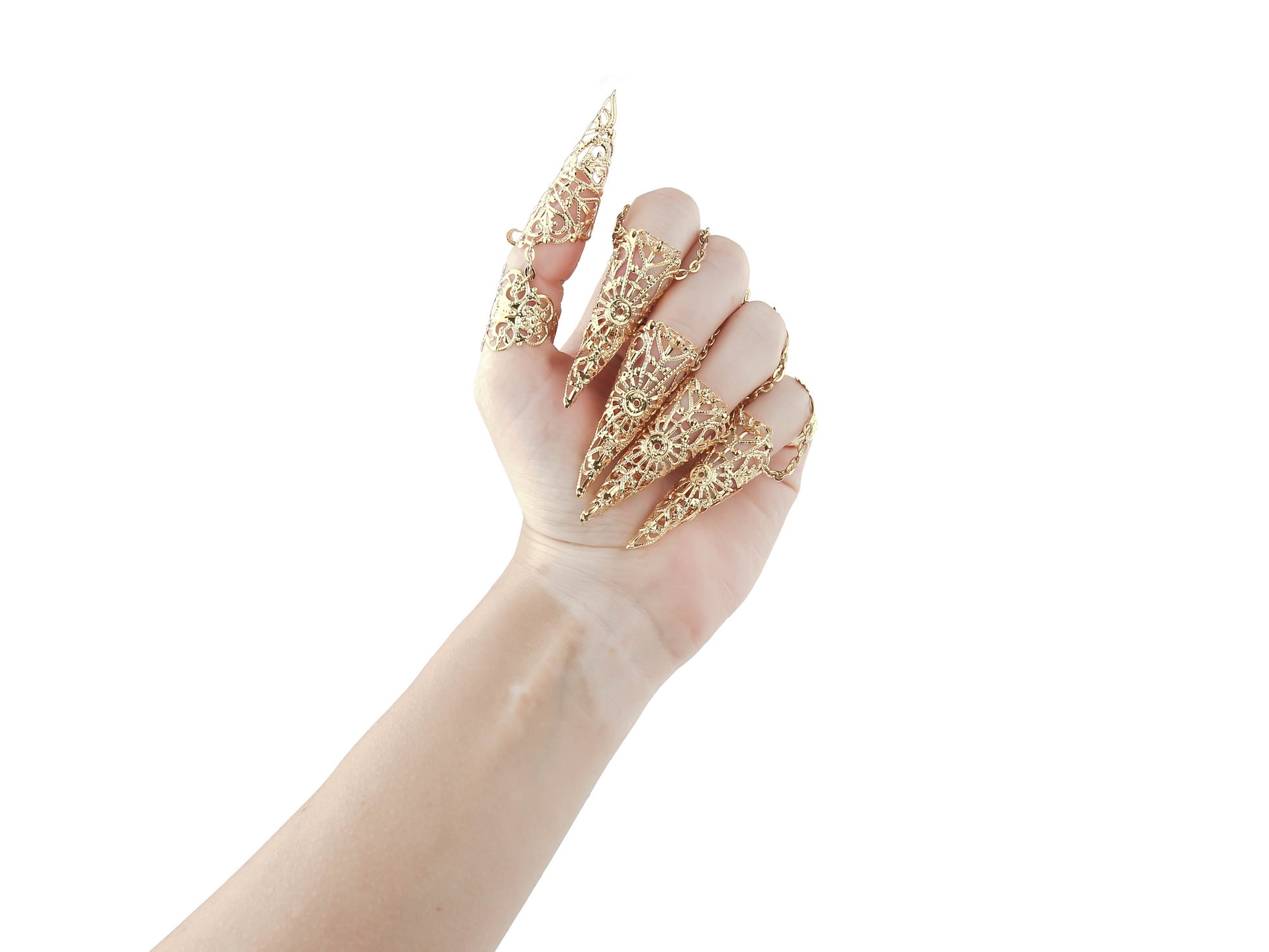 A hand is adorned with a striking set of gold claw rings from Myril Jewels, featuring detailed neo-gothic designs perfect for individuals who embrace gothic and alternative styles. These claw rings serve as an eye-catching addition for Halloween, complementing punk and gothic-chic wardrobes, and add an edgy touch to minimal goth or witchcore daily attire. They are also ideal for enhancing rave party outfits, festival looks, or as a unique gift for a goth girlfriend.
