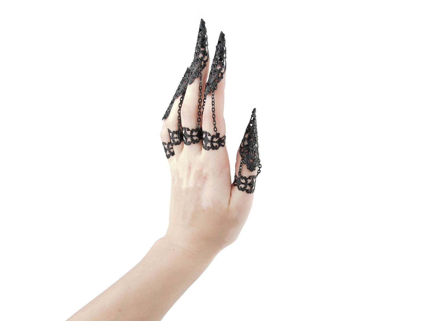 Embrace the edgy elegance of Myril Jewels with this bold, handcrafted full hand set of armored claw rings, designed for the dark-avantgarde enthusiast. These elaborate black claw rings reflect a Neo Gothic vibe, perfect for gothic-chic, Witchcore, and Whimsigoth styles, making them an audacious choice for Halloween, punk events, or as a distinctive addition to everyday wear.