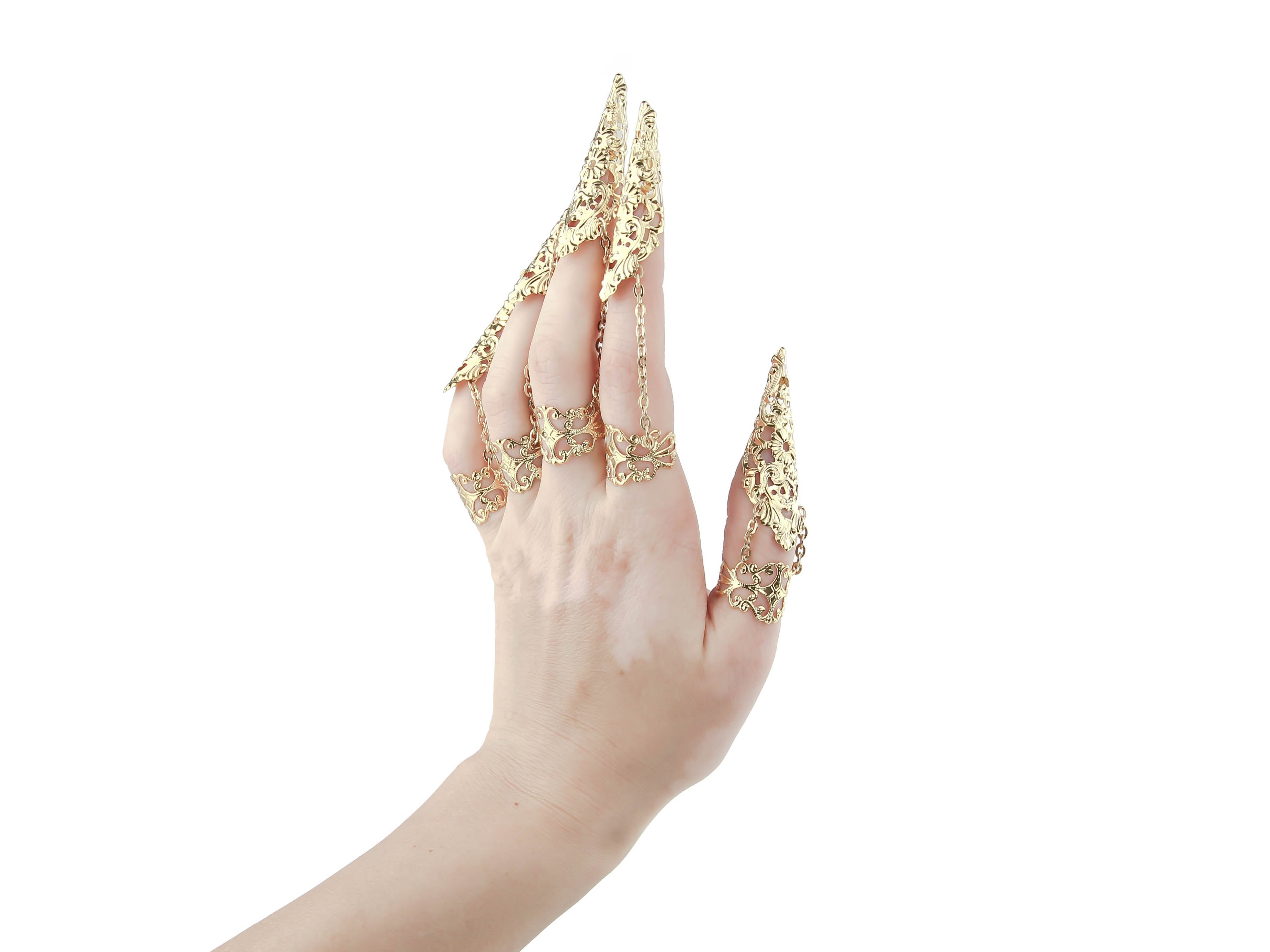 Embrace the dark elegance with Myril Jewels' armored claw rings, an avant-garde full hand set that embodies the essence of Neo Gothic luxury. Perfect for the gothic and alternative style enthusiast, these gold claw rings offer a bold statement for Witchcore and Whimsigoth wardrobes, making them a must-have for Halloween jewelry collectors and punk fashion rebels seeking everyday wear with an edge