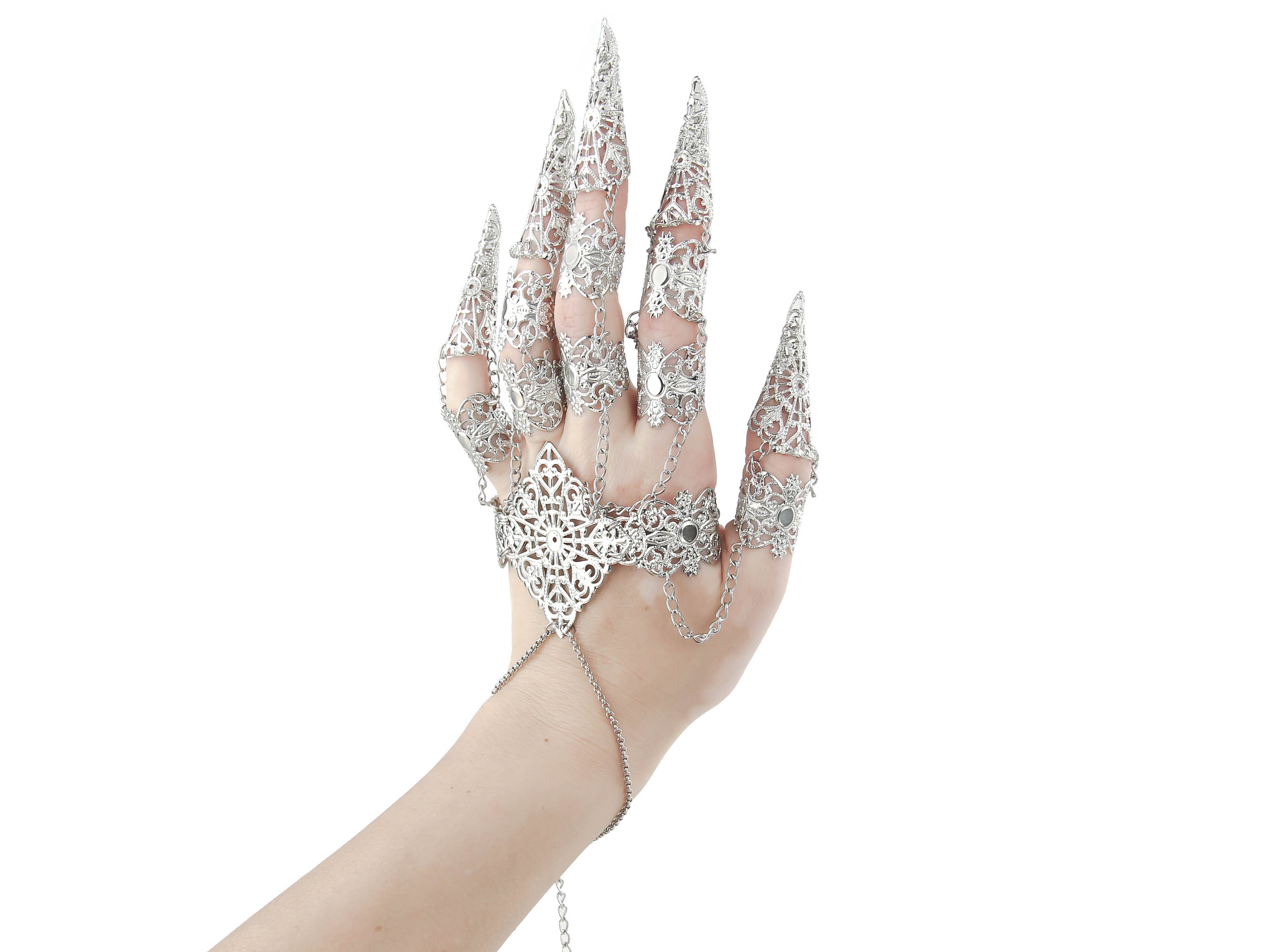 An elegant silver full hand metal glove with intricate claw rings creates a striking silhouette against a white background, a signature Myril Jewels design. This dark, avant-garde accessory embodies neo-gothic luxury, perfect for gothic, Witchcore, and punk fashion enthusiasts seeking bold jewelry statements