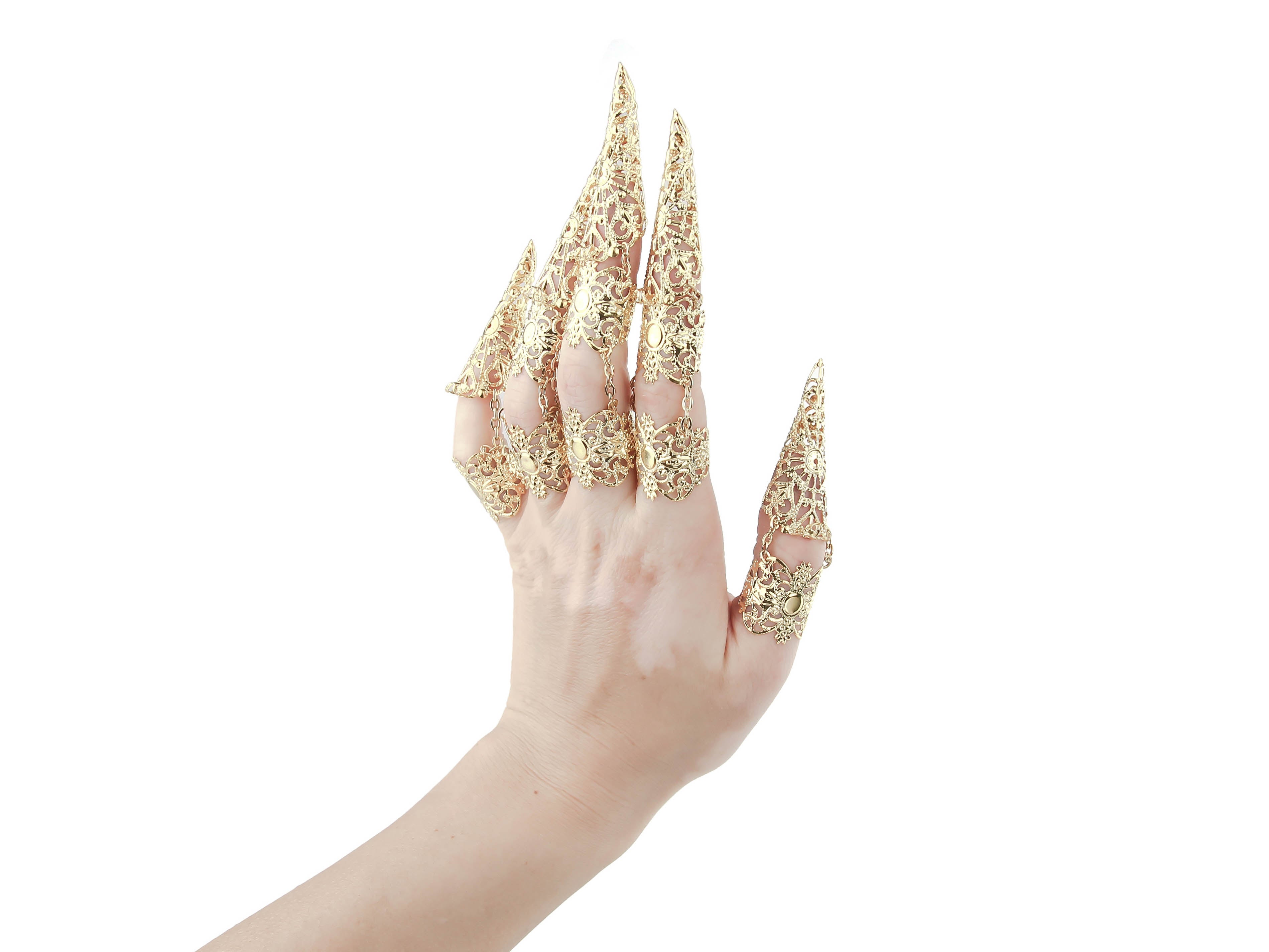 Discover the bold world of Myril Jewels with this full hand set of armored gold claw rings, a striking statement for the gothic and alternative fashion lover. These claw rings feature an exquisite filigree design, ideal for Halloween, punk, Neo Gothic, and Gothic-chic enthusiasts. The intricate metalwork adds a dramatic touch, perfect for whimsigoth and witchcore aesthetics, as well as for adding an edge to minimal goth daily wear or making a splash in drag performances