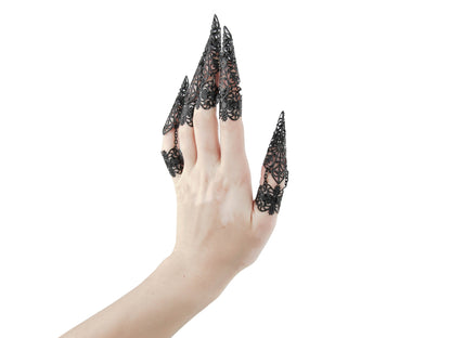 Step into the world of Myril Jewels with this captivating full hand set of midi rings, masterfully designed with claw-like extensions for a bold neo-goth statement. These black rings exude a dark-avantgarde allure, perfect for those who embrace gothic-chic and whimsigoth styles. The intricate detail of each piece makes it an essential accessory for Halloween, while also being versatile enough for everyday wear.