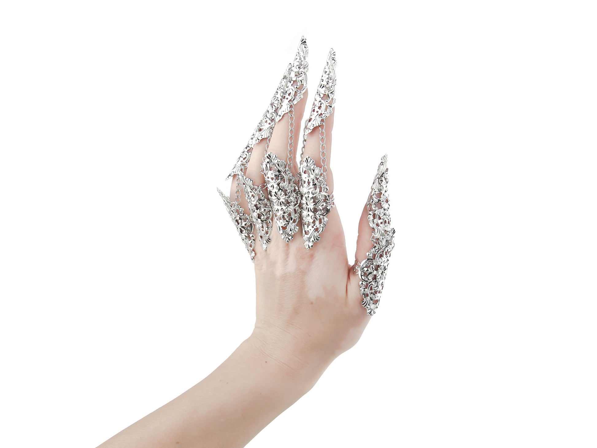 A full hand adorned with Myril Jewels' ornate rings, each finger capped with an elegant nail claw. These pieces capture the essence of dark-avantgarde style, ideal for a neo-gothic look or adding a dramatic touch to witchcore and whimsigoth outfits, perfect for festivals or as a unique goth girlfriend gift.