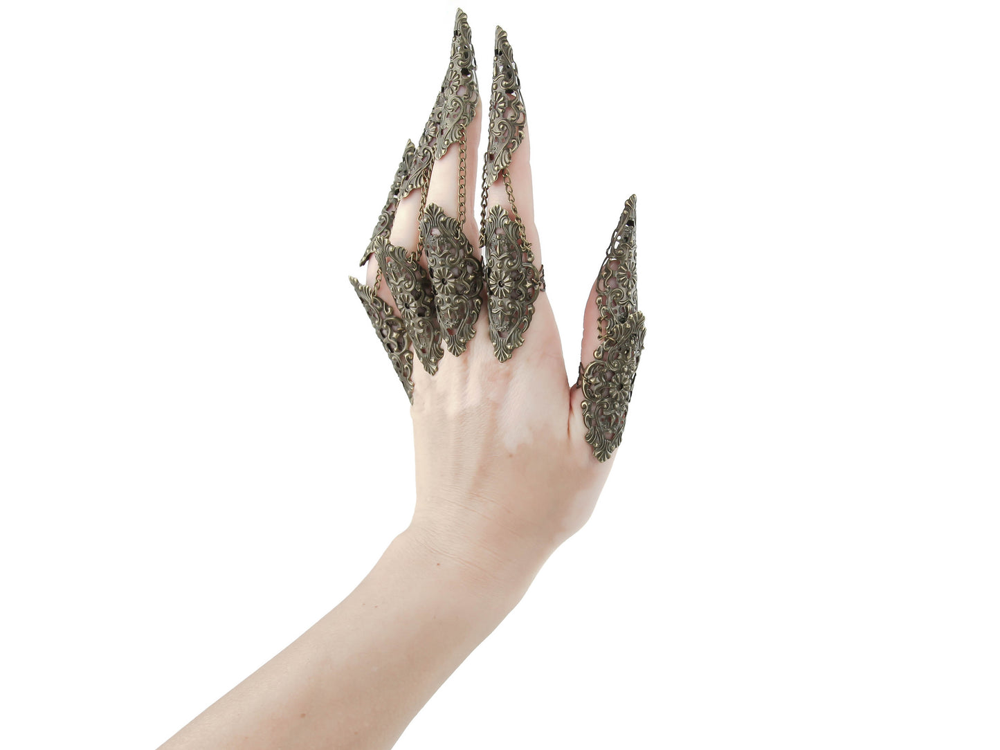 Unveil your inner goth with Myril Jewels' full hand set of intricate bronze rings, each culminating in a striking nail claw. These neo-gothic treasures, perfect for Halloween, embody a bold statement for punk jewelry lovers and those with a witchcore flair, offering a unique touch to any drag queen jewel collection or as a standout goth girlfriend gift