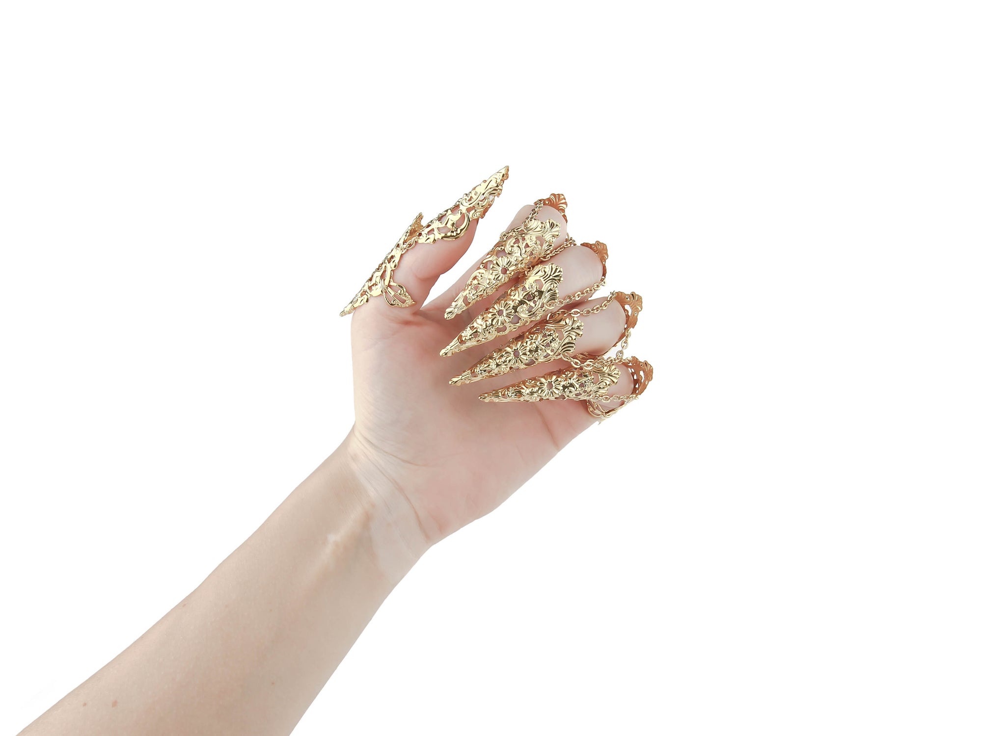 A hand is adorned with a striking set of gold claw rings from Myril Jewels, featuring detailed neo-gothic designs perfect for individuals who embrace gothic and alternative styles. These claw rings serve as an eye-catching addition for Halloween, complementing punk and gothic-chic wardrobes, and add an edgy touch to minimal goth or witchcore daily attire. They are also ideal for enhancing rave party outfits, festival looks, or as a unique gift for a goth girlfriend.